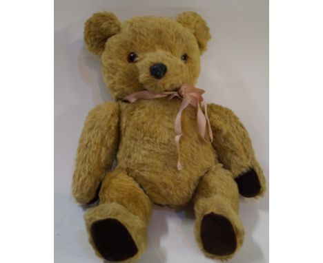 A Real Soft Toys of Watford teddy bear, circa 1960/70s with golden plush coat, dark brown corduroy pads, moulded resin nose, 