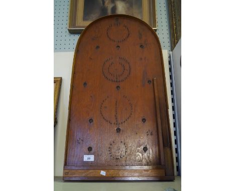 A vintage bagatelle game board