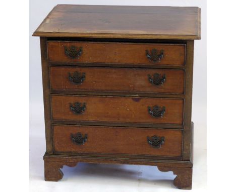 An 18th Century Georgian mahogany chest of drawers, of small proportionsHaving four graduated and cockbeaded long drawers, ap