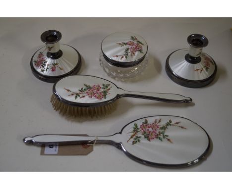 A glamorous vintage five piece dressing table set, English circa 1950s, comprising a hand mirror, hairbrush, a pair of candle