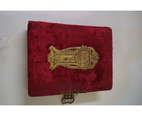 A nice quality Victorian photo album, applied with classical gilt metal mounts and sprung clasp to the red velvet cover, open