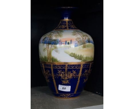 A large Noritake of Japan hand-painted vase, decorated with a castle in landscape scene, blue marks to base, height 30cm