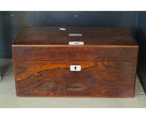 A Victorian rosewood veneered tea caddy with mother of pearl inlay