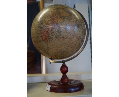 A "Geographia" 10" Terrestrial globe, circa 1930's, raised on a later stand