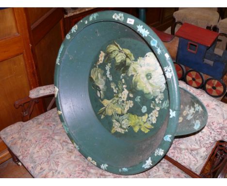 A 20th century painted pigs trough, having floral decoration 