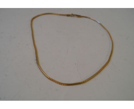 A .750 necklace, with engine turned square links, total weight approx 14.6gms.