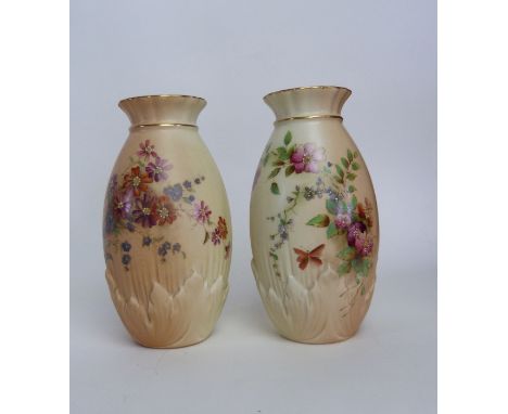 Two Royal Worcester blush ivory cylindrical vases, each having relief and hand-painted with flowers and foliage, puce factory