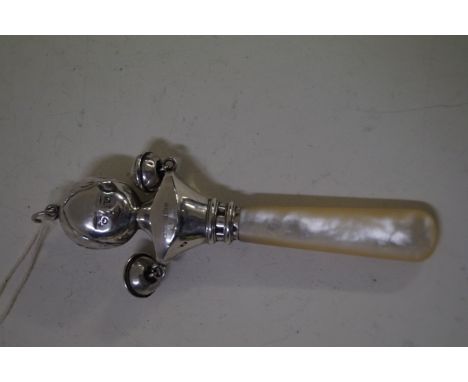 A George V hallmarked silver baby's rattle, with mother of pearl handle, Birmingham 1914.