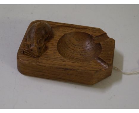 A Robert 'Mouseman' Thompson oak ashtray, carved with the signature mouse, approx 10x8cm.