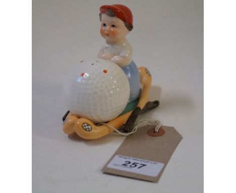 A Goebel of Germany ceramic novelty 'golf' salt and pepper pots and stand, the design attributed to Karl Wagner, circa 1957, 