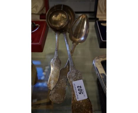 A group of continental white metal items to include a three piece serving set comprising ladle, spoon and fork together with 