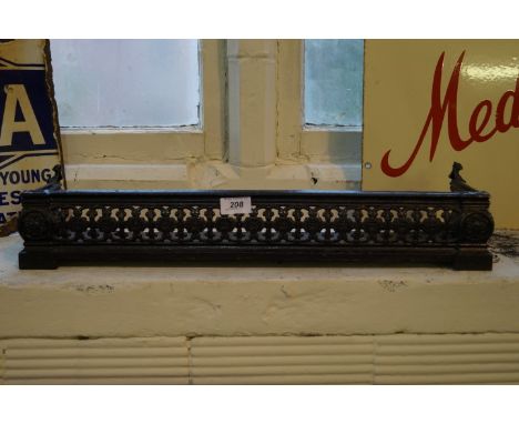 A late 19th century cast metal fire surround of small proportions, 60cm length  