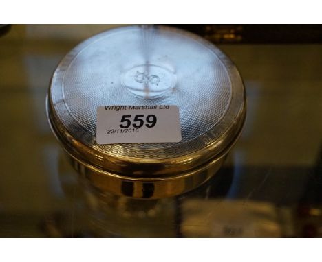 A hallmarked silver engine turned lidded ladies powder jar