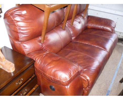 A good quality brown leather electric reclining two seater sofa.