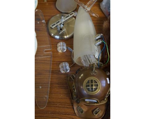 A mixed lot to include a modern copper model of a divers helmet, together with a very unusual frosted glass and purspex wall 