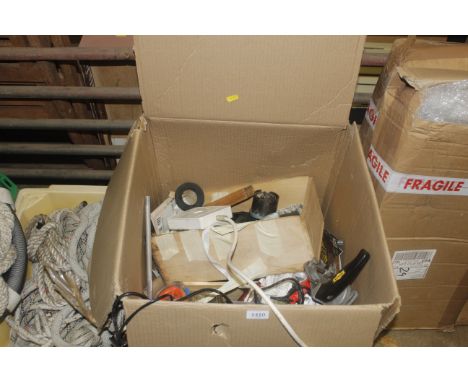 A box containing tools to include drill bits; soldering iron; fixings and fastenings; strimmer cord etc.