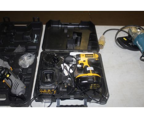 A DeWalt DC725 cordless drill in case with two batteries and a charger