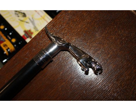 A walking stick with a Jaguar car mascot handle (60)