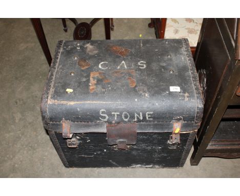 A leather dome topped trunk named to William Insall