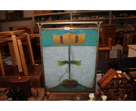 An Art Nouveau brass firescreen, possibly Czechoslovakian with glass bead and brass panel, AF 