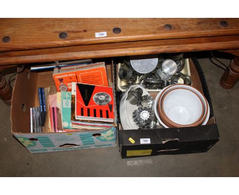 Two boxes containing various records, CDs, kitchenalia etc.