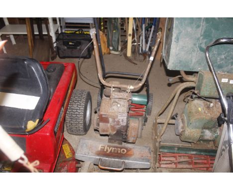A Flymo DM petrol rotovator with Briggs & Stratton 3hp engine