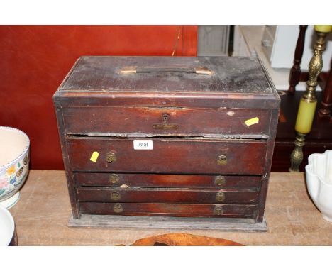An oak tool chest fitted with four drawers, named to P H Langton AF and contents