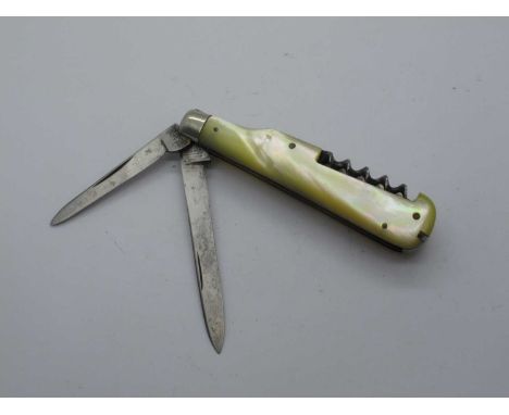 Slater Brothers; Two blades, AWL, corkscrew, tweezers, spike, Mother of Pearl scales, N/S bolster, brass linings 8.5 cm.