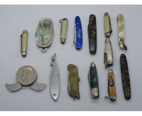 Coin Type Knife, two blades; George Wostenholm, two blade, turtle scales; Richards advertising knives; Single blade knife, br