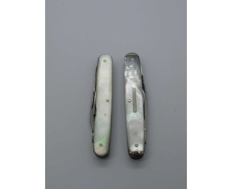 Harrison Fisher and Co, Sheffield, mother of pearl scales two blades, scissors, brass linings, 7.5cm. R. Groves and Son Ltd, 