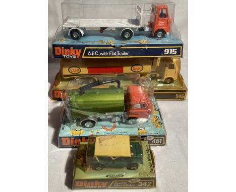 Dinky: A collection of assorted Dinky Toys vehicles to include: AEC Esso Fuel Tanker 945, AEC with Flat Trailer 915, Johnston