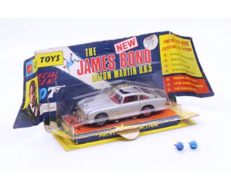 Corgi: A boxed Corgi Toys, James Bond Aston Martin D.B.5, Reference No. 270. Rare, original, winged box with two ejector figu