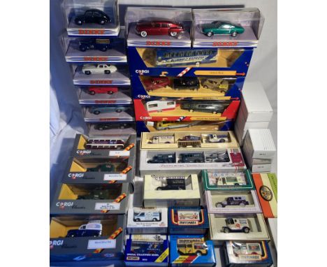 Diecast: A collection of assorted diecast vehicles to include: Corgi Volvo Bus, Volvo with Caravan, Mini Racers set, Corgi Cl