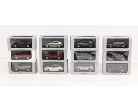 Porsche: A collection of twelve cased and boxed 1:43 Scale Porsche vehicles to include Minichamps examples. Original boxes. S