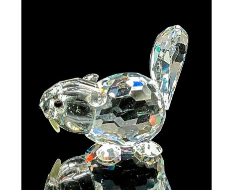 Clear faceted crystal figure of a little beaver with frosted teeth. Swarovski mark. Item number 7616NR000003. Part of the End