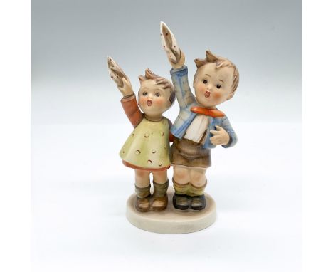 Hand painted figure of a boy and girl waving handkerchiefs. Goebel backstamp. Issued: 20th centuryDimensions: 3.75"L x 2.25"W