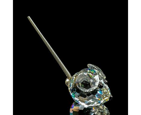 Clear faceted crystal tiny figure of a mouse with a metal spring tail. Swarovski mark. Item number 7655NR23. Part of the In A