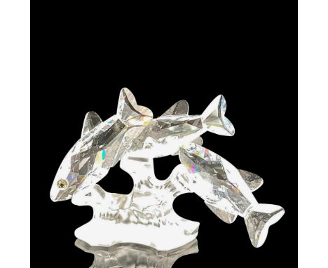 Clear crystal bodies with aqua crystal eyes hovering above a satin crystal coral. Swarovski backstamp. 7644 057 000. This ite