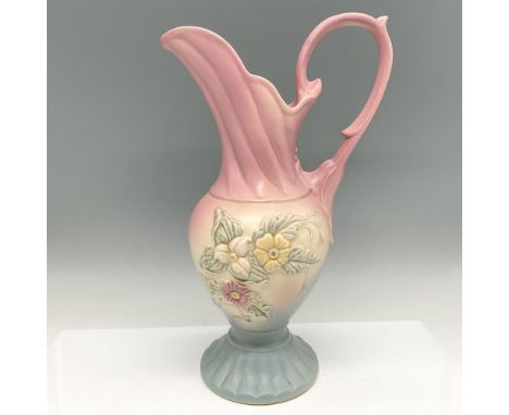 Lovely pastel colored pitcher with raised floral design continuing into blue base. Hull Art U.S.A. raised mark. W-19. Issued: