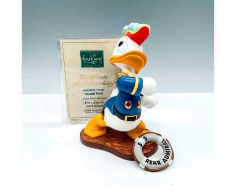 Walt Disney Classic Collection porcelain figurine of Donald Duck from Sea Scouts and his life saver float. This item has its 