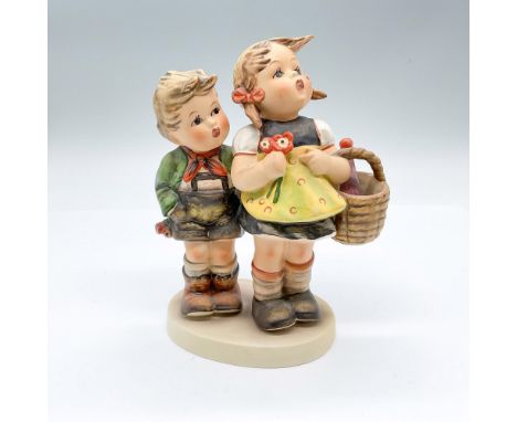 Hand painted figure of a young boy and girl with a basket of wine. Goebel backstamp. Issued: 20th centuryDimensions: 4.75"L x