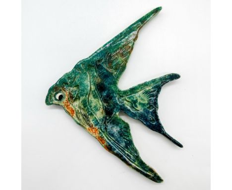 A flat figure of a blue and green tropical fish.Goldscheider backstamp. Goldscheider Pottery Plaque, Tropical Fish Issued: 20
