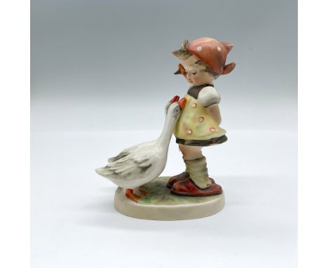 Hand painted figure of a young girl with two geese. Goebel backstamp. Issued: 20th centuryDimensions: 4"L x 2.5"W x 4.75"HMan