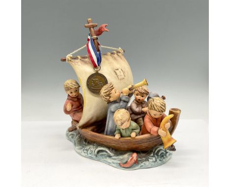 Hand painted adorable sailing design with children in sailboat and fish in the sea. Commemorating the 500th anniversary of Co