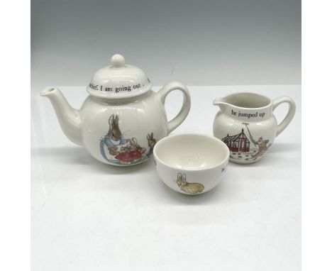 New in box - 4 piece set includes decorated tea pot with lid, cream jug and sugar bowl. Wedgwood backstamp. This item has its