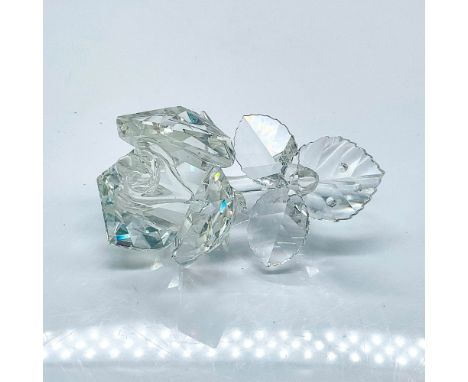 Multifaceted clear crystal rose on stem in full bloom. Item number 7478NR000001. Swarovski etched backstamp. This item has it