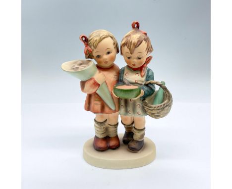 Hand painted figure of two girls with a bouquet of flowers, a bowl of soup, and a basket wine. Goebel backstamp. Issued: 20th