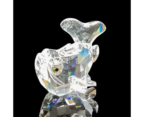 Clear crystal body, fins and tail with yellow and black inset eyes. Swarovski backstamp. 7644 000 003. This item has its orig