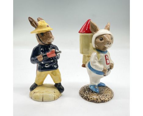 Fireman DB75 in back coat, yellow pants and helmet; 2"L x 1.75"W x 4.25"H. Astro Bunny Rocket Man in white suit with blue acc