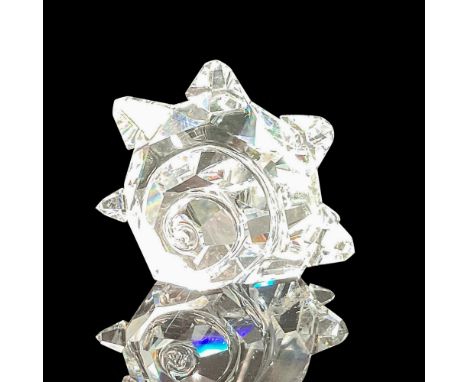 Part of the Silver Crystal Collection. Clear crystal with faceted conch swirl in center and shell protrusions. Swarovski back